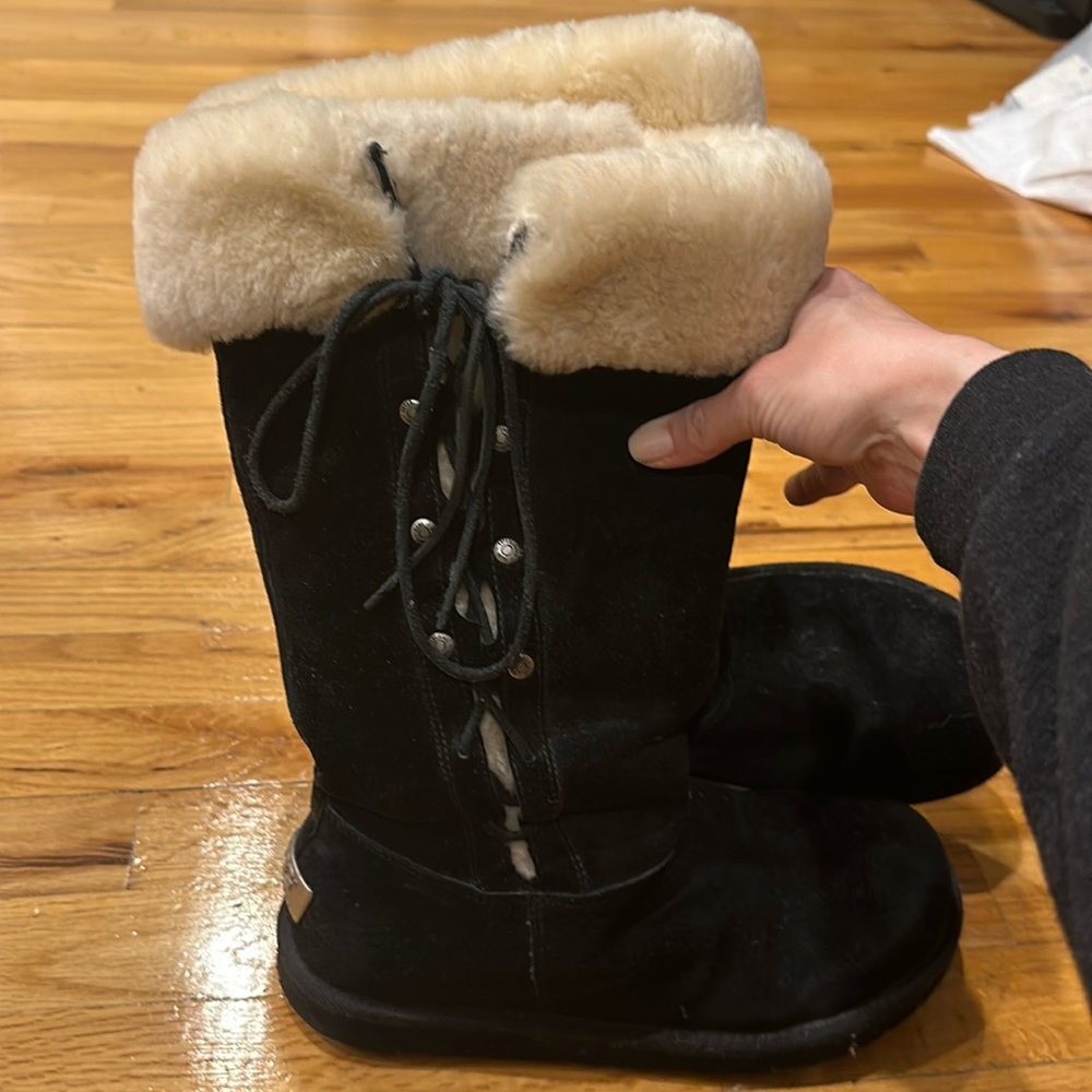 Black and white fur lace-up UGG boots
